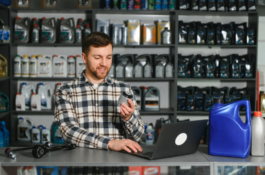 Workflow 360°’s Communications Hub and Document Management System Turns Chaos into Cash 6 service advisor at an auto shop holding a part and inputting it into the workflow solutions communication hub